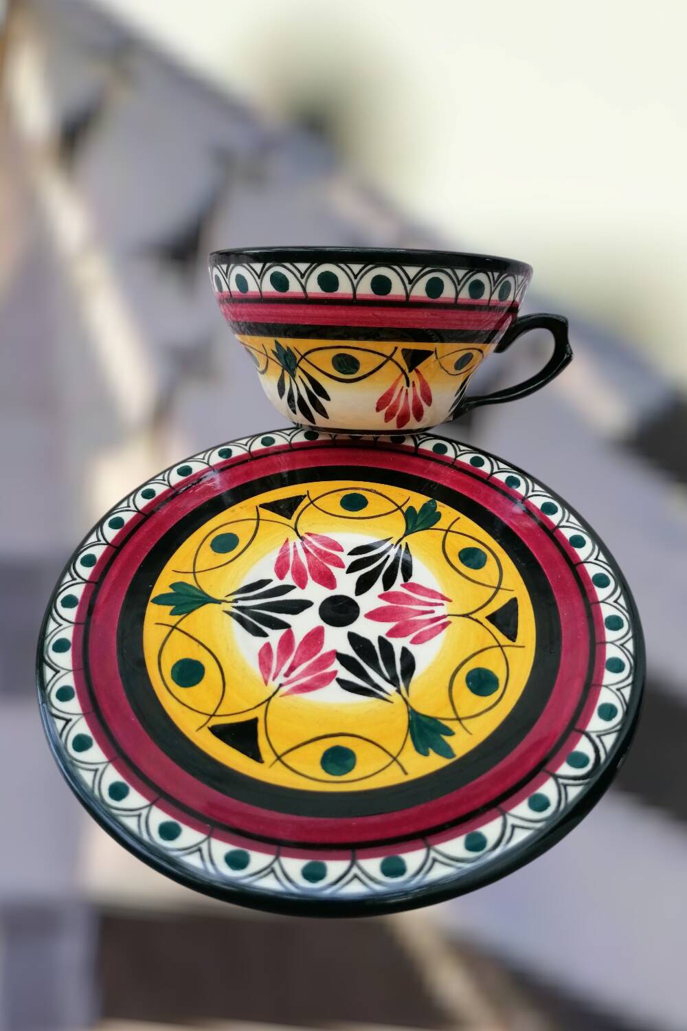 Hand-painted Breton earthenware cup and saucer from St Jean de Bretagne