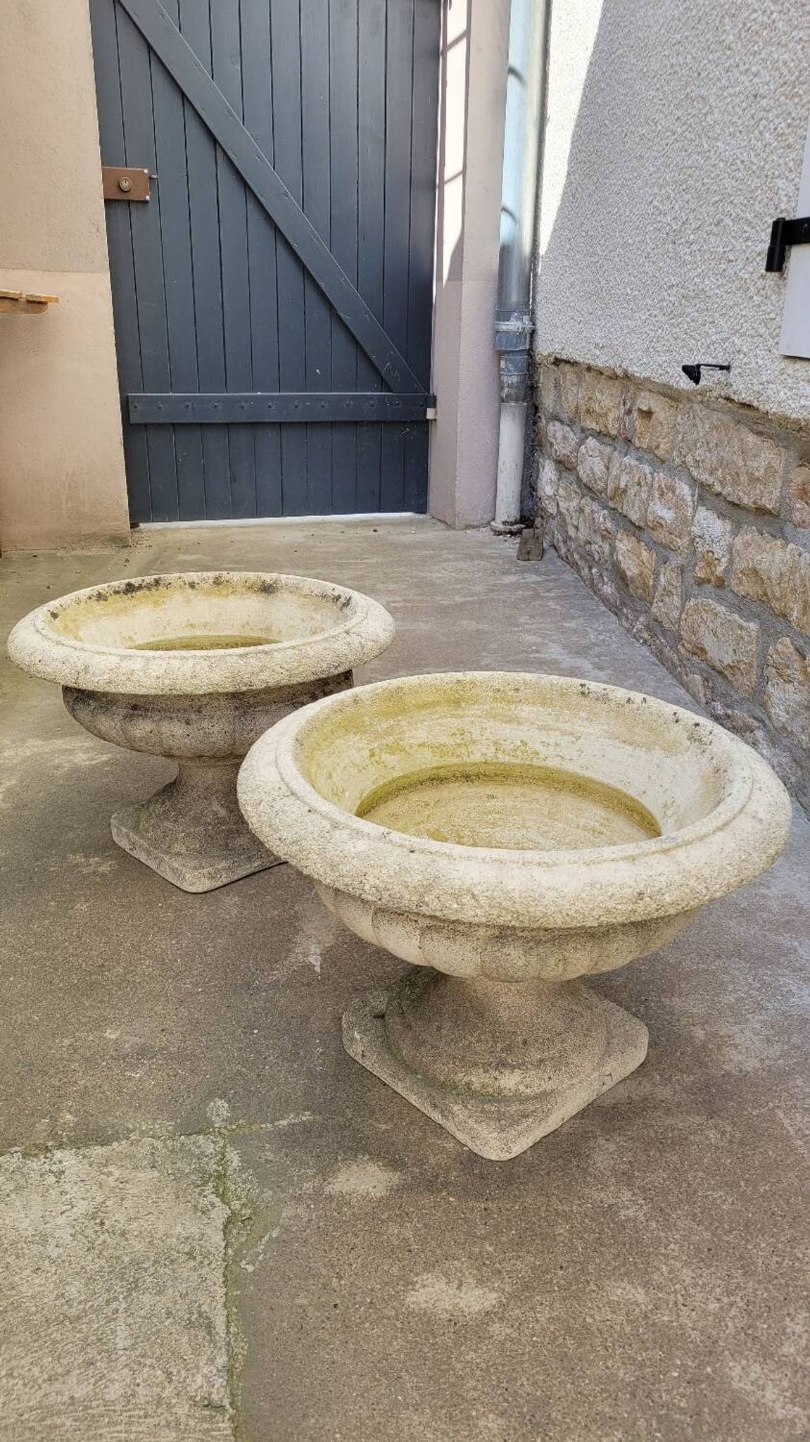 Pair of medicis vases in old reconstituted stone 1950s