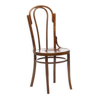 Bent wood chair with floral motif