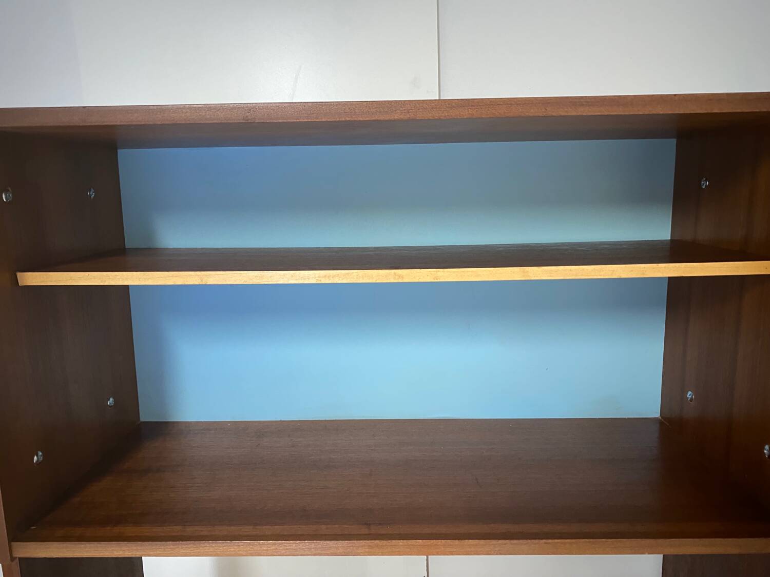 Vintage bookcase with compass feet from the 60s