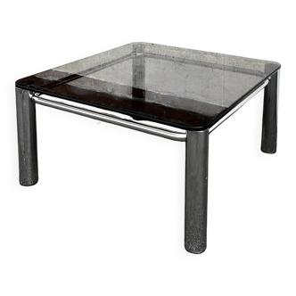 Vintage smoked glass coffee table with chrome structure.