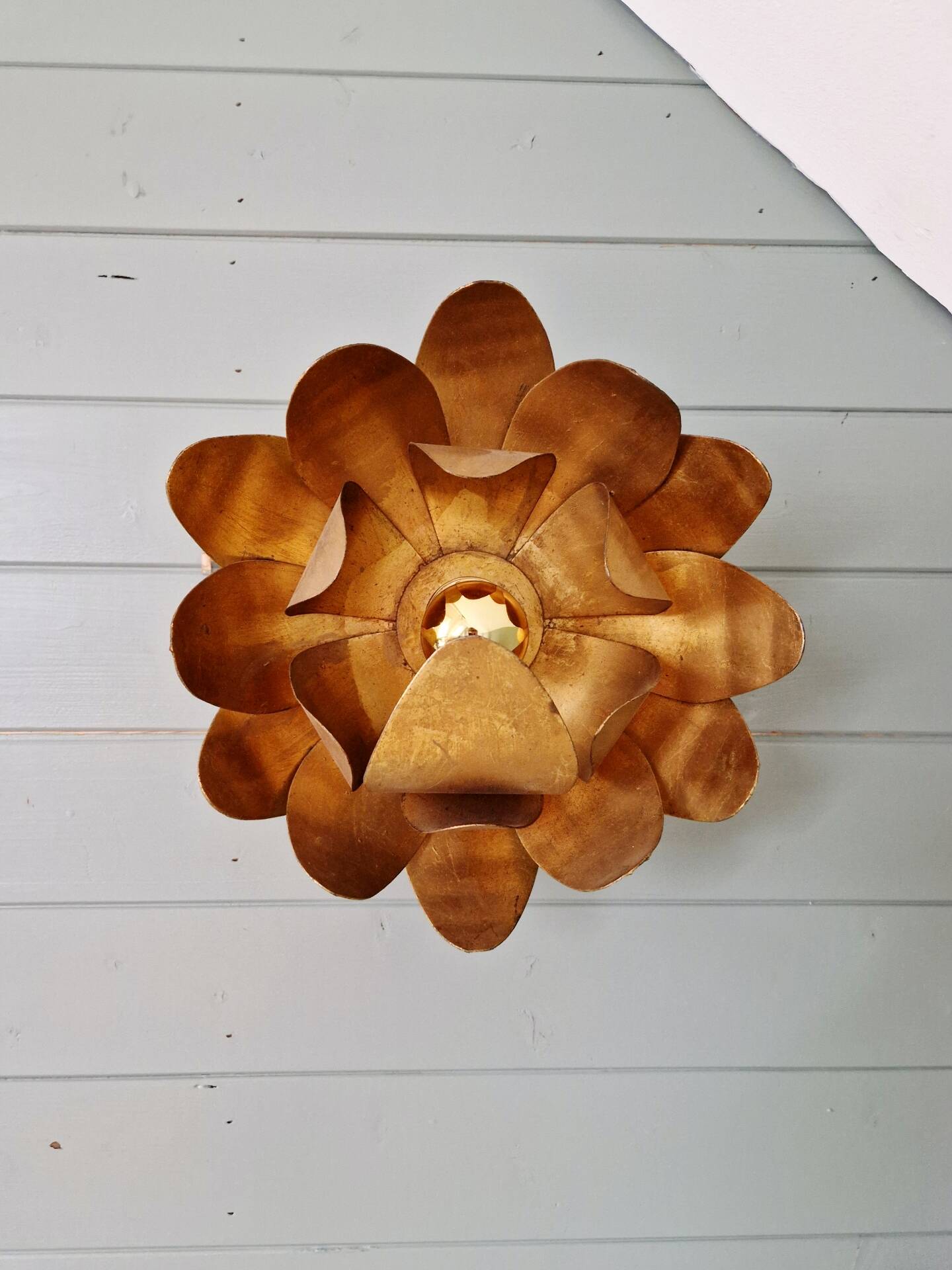Gold metal floral wall light, 1960-70.
