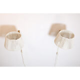 Pair of pine accordion sconces with cotton rope lampshade.
