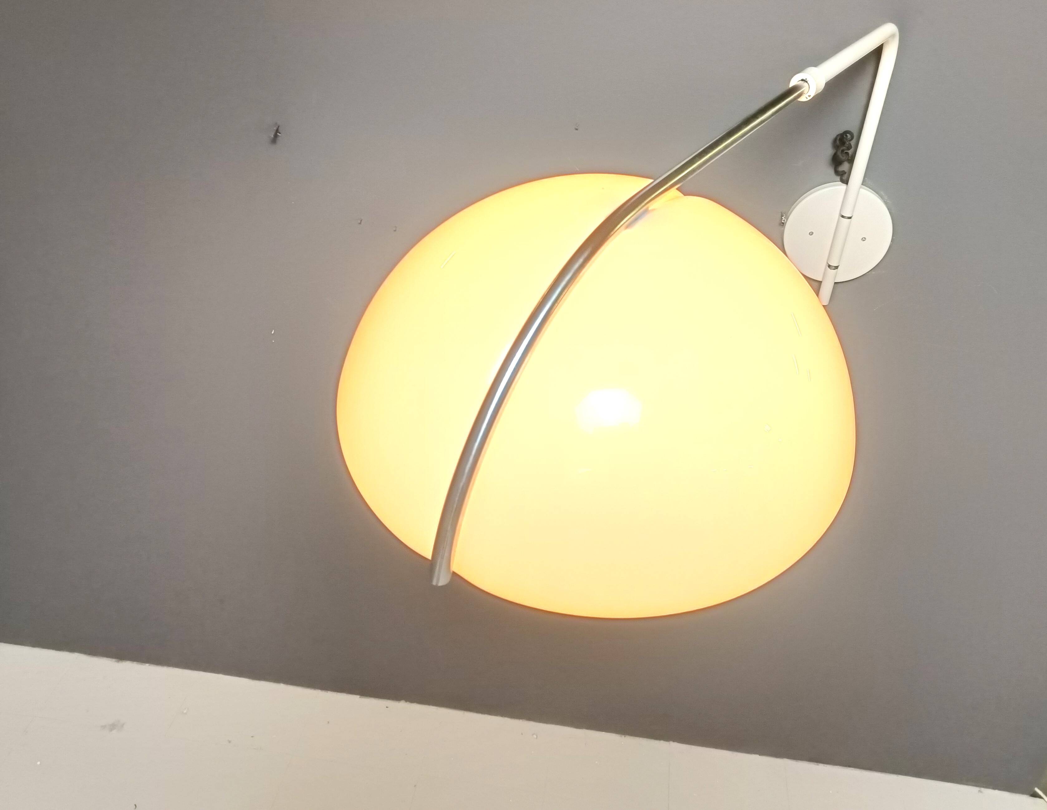 Vintage wall lamp by Luigi Massoni for Guzzini, 1970s