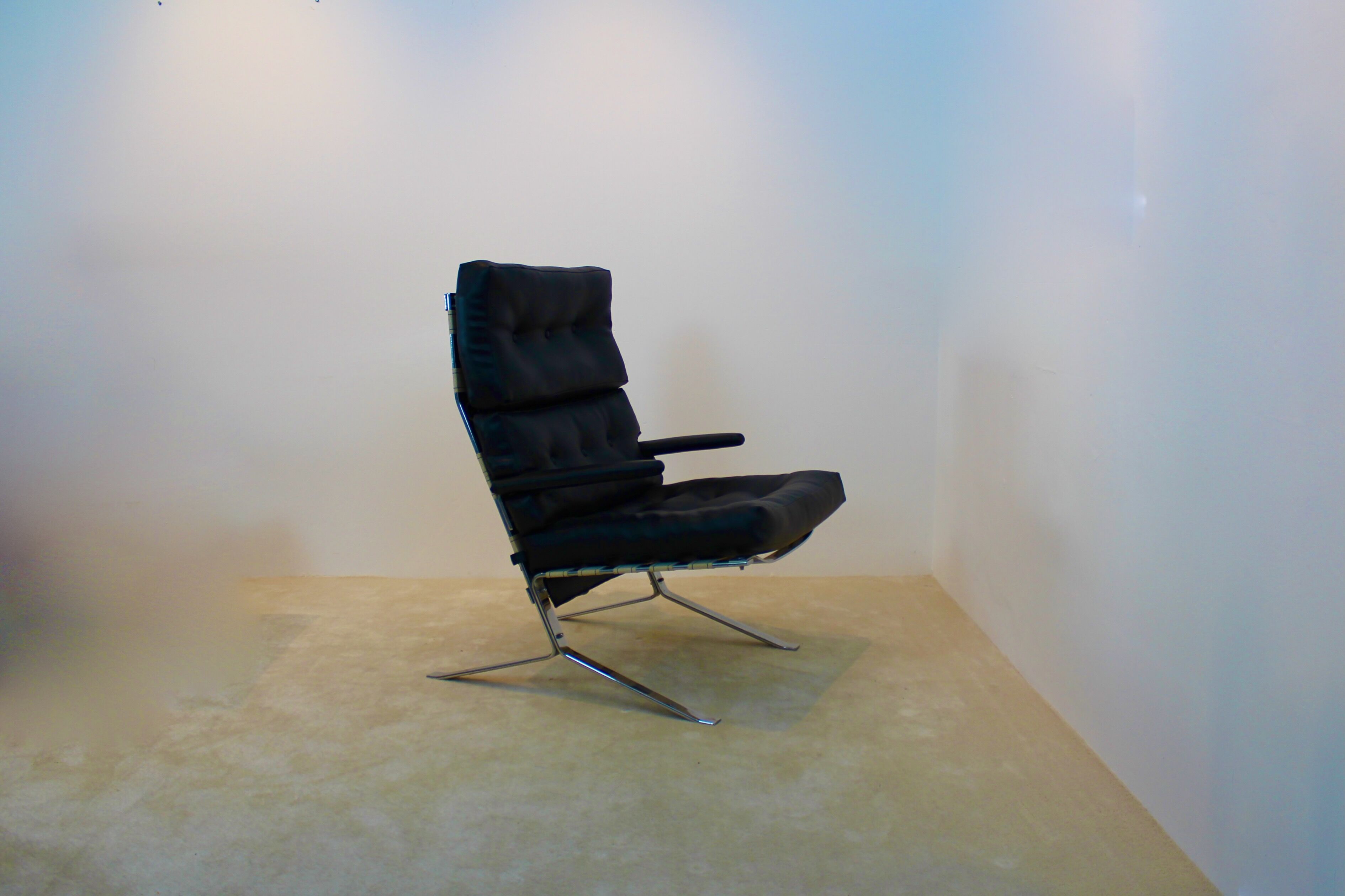 Fauteuil belge vintage chrome et cuir