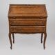 Charming antique oak secretary with drawers.