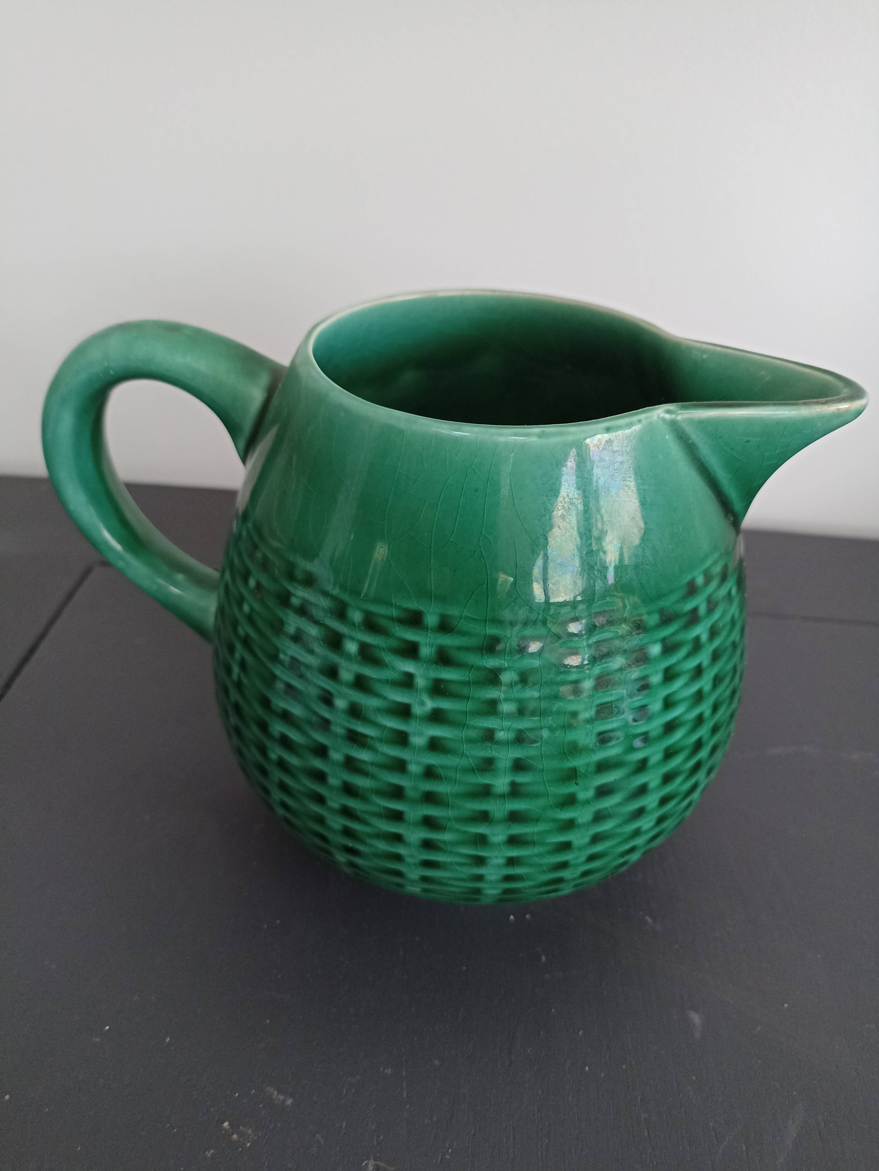 Antique ceramic milk pitcher