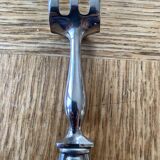 Art Deco silver metal leg of lamb cutlery