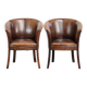Ensemble de deux fauteuils en peau de mouton / fauteuils tubulaires avec une belle patine.
