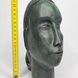 Stylized female head in terracotta, modernist style, signed, 23 cm