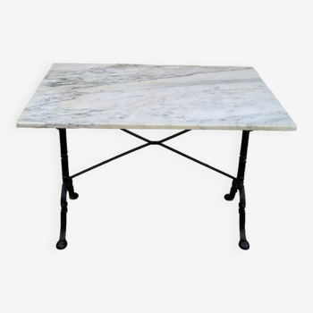 Marble and cast iron bistro restaurant table