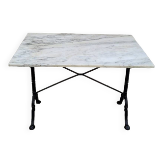 Marble and cast iron bistro restaurant table