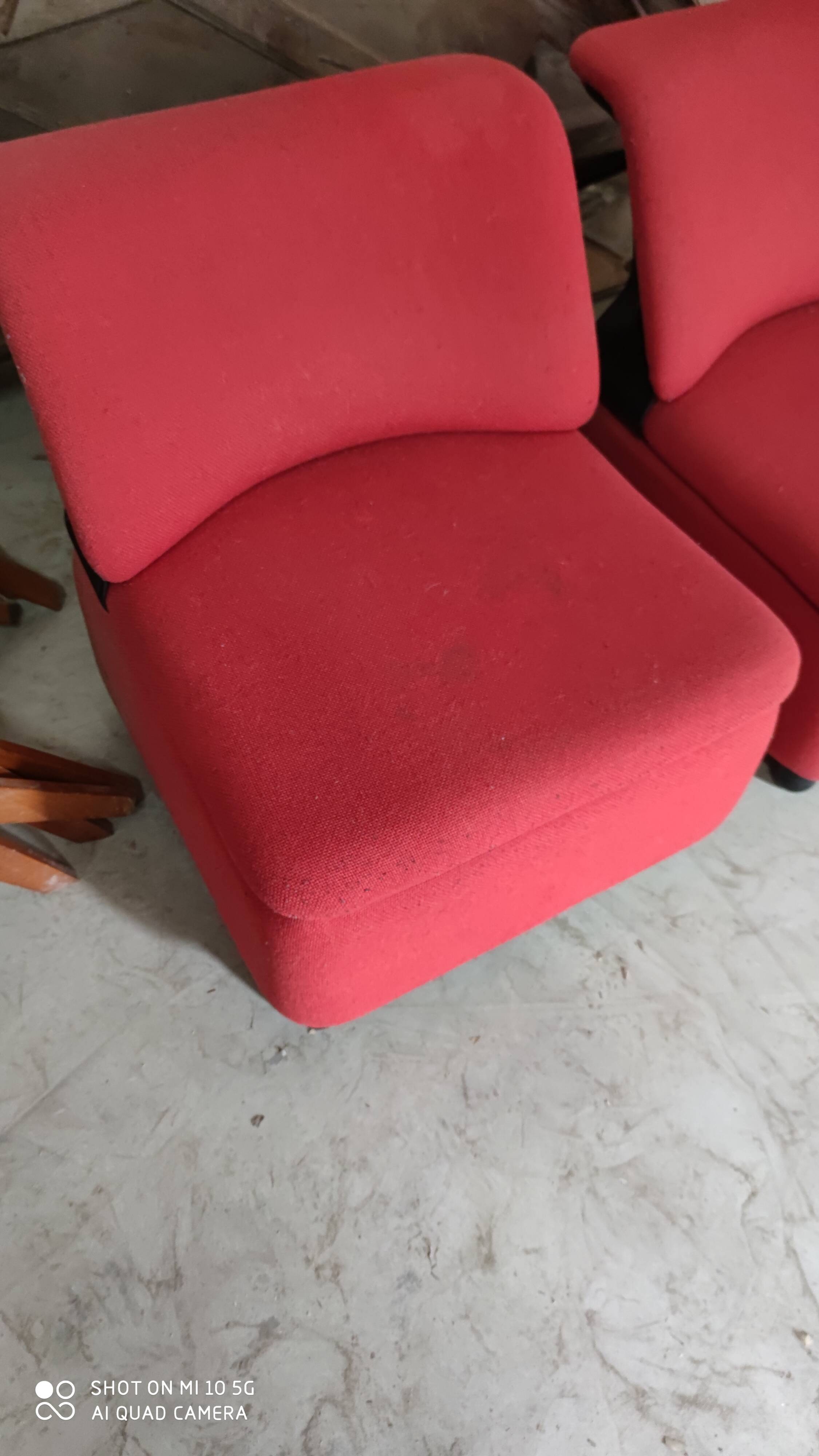 Pair of lounge chairs in red tweed and black vinyl
