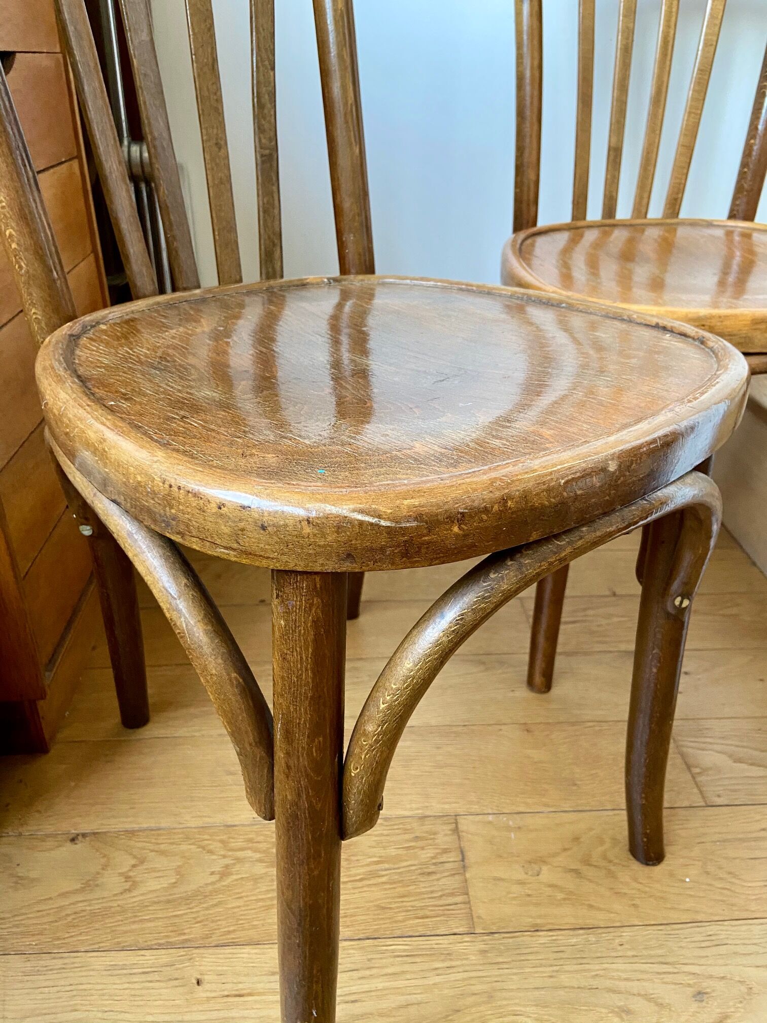 Pair of wooden bistro chairs