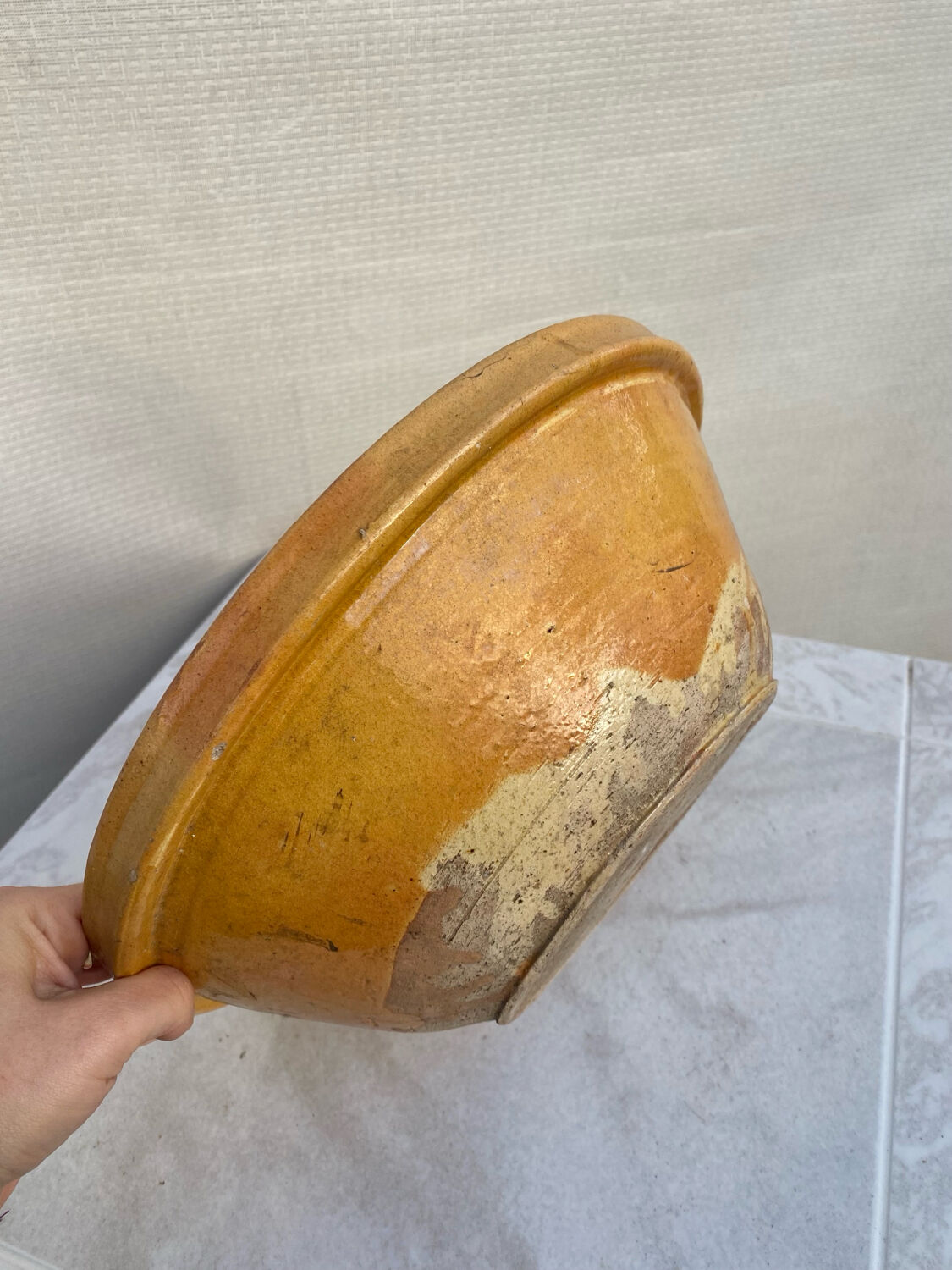 Old yellow glazed terracotta gresale