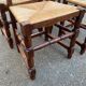 4 solid wood chairs with straw seats and high backs, 108cm.