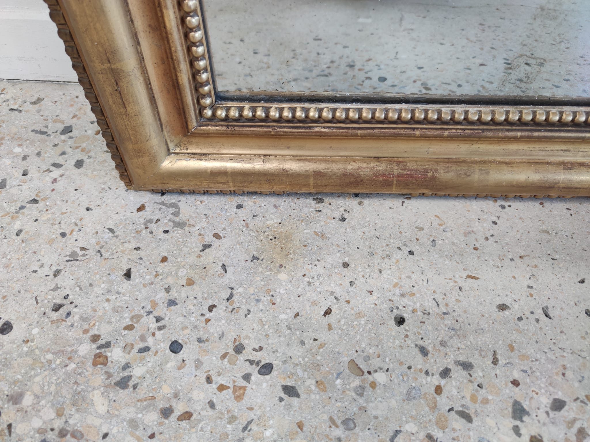 Louis Philippe gilded mirror with gendarme hat nineteenth H:130cm