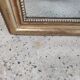 Louis Philippe gilded mirror with gendarme hat nineteenth H:130cm