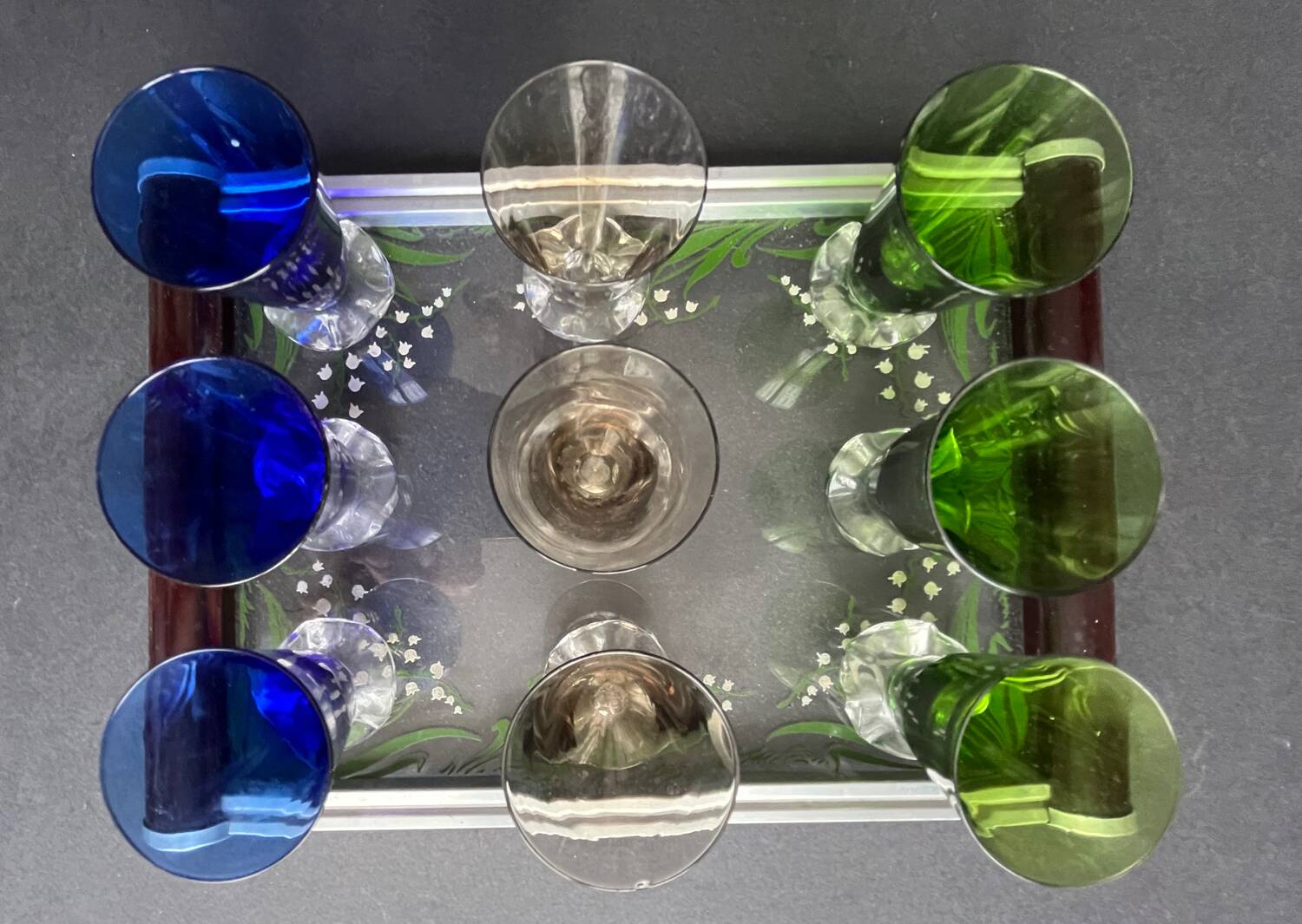 Service of 9 colored liqueur glasses