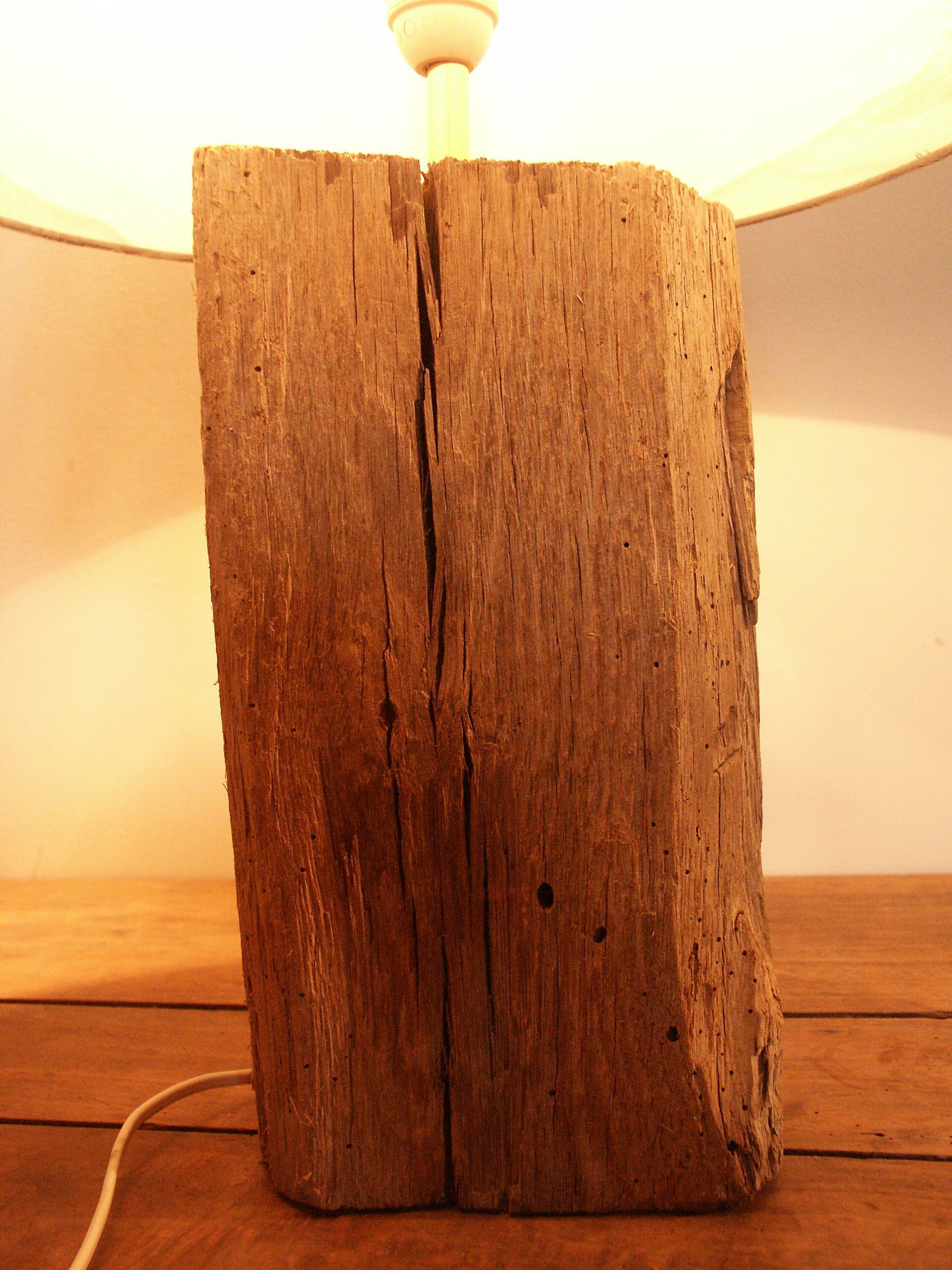 Lamp on old oak beam