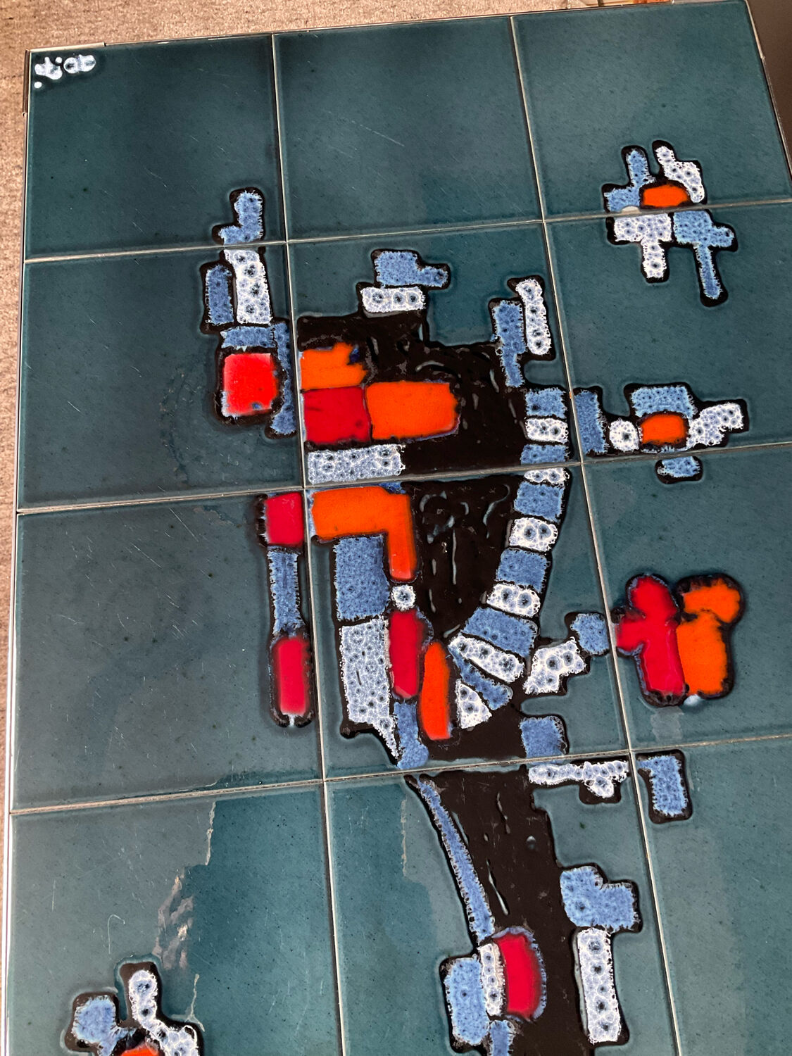 Coffee table in signed ceramic and chromed metal 70s