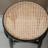Curved wood and cane stool