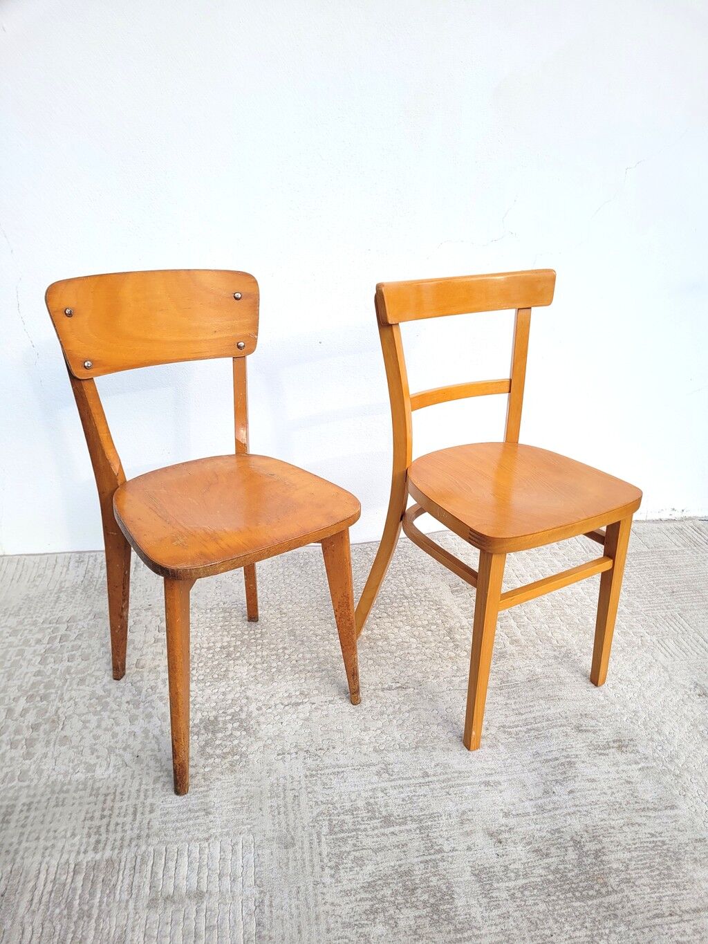 Pair of bistro chairs, one Thonet.