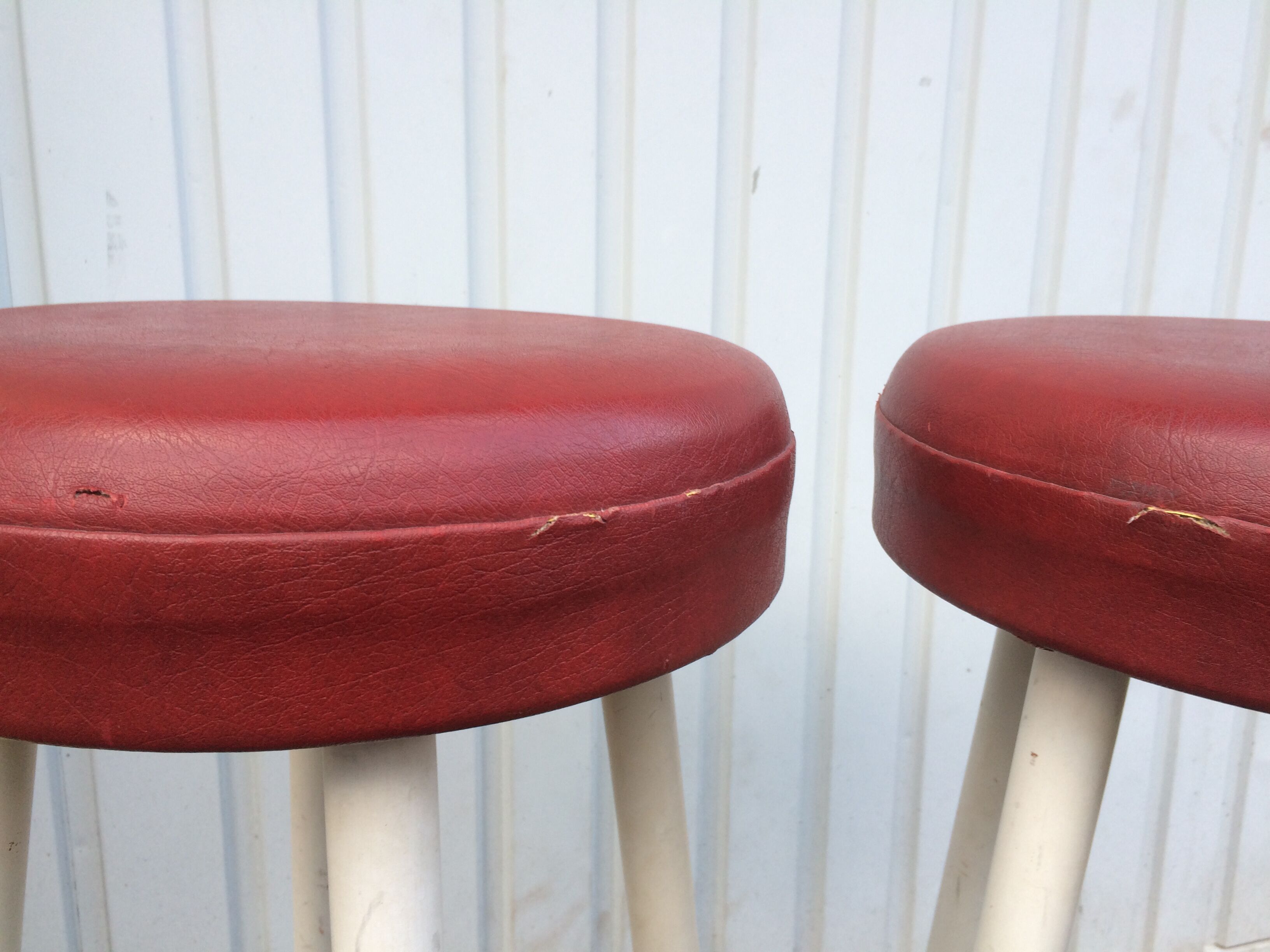 Pair of white and red 1950s bar stools