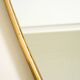 Heavy mid-century brass kidney-shaped wall mirror from Münchner Zierspiegel