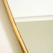 Heavy mid-century brass kidney-shaped wall mirror from Münchner Zierspiegel