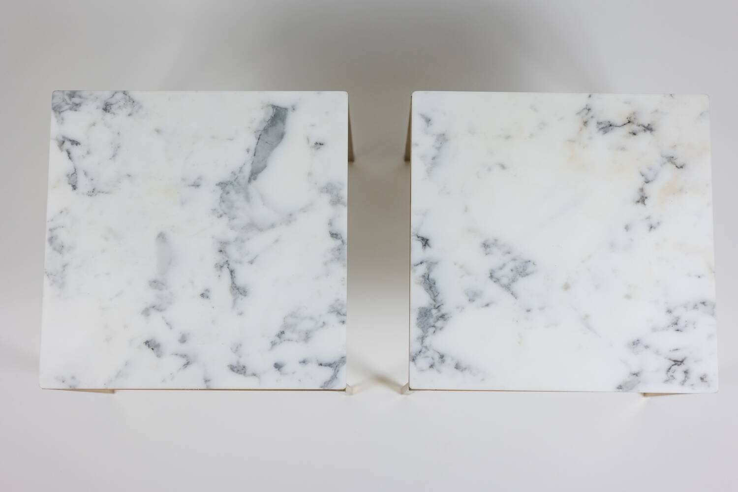 Pair of marble and gilt bronze end tables. 1970s.