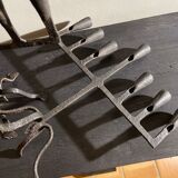 Pair of beaten iron candlesticks