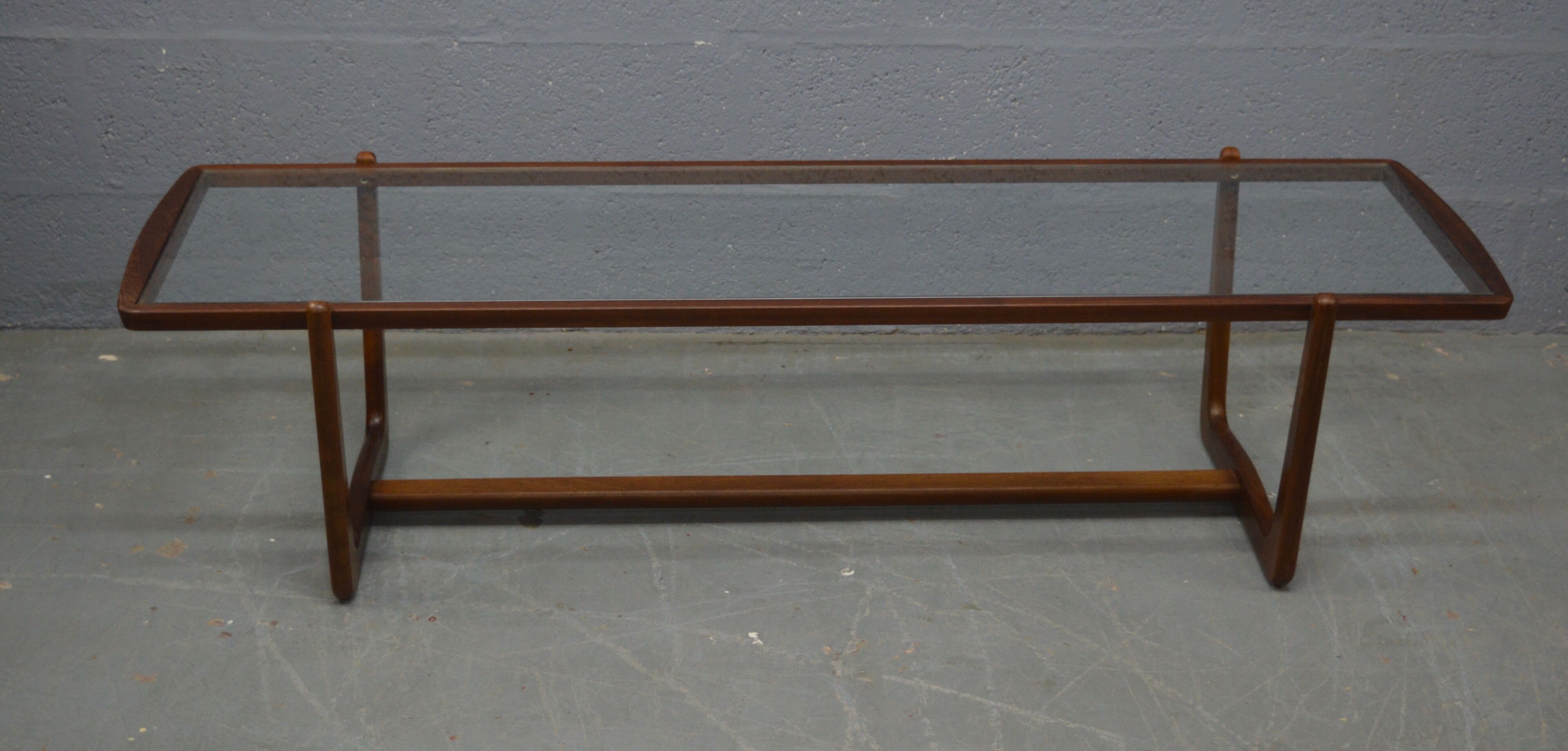 Mid century glass topped coffee table