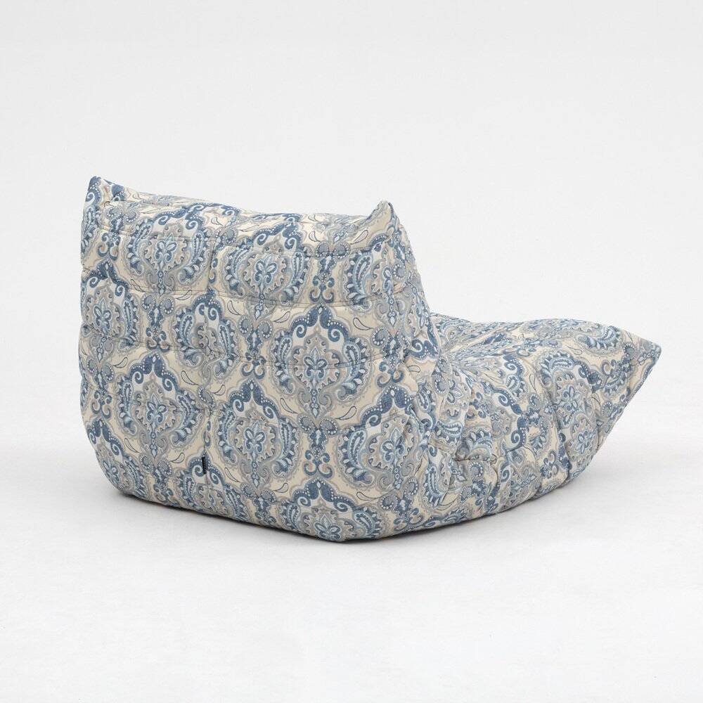 Togo lounge chair and pouf in patterned fabric by Michel Ducaroy for Ligne Roset, 1973, set of 2
