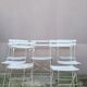 Series of 6 chairs and 1 folding armchair of iron garden bistro
