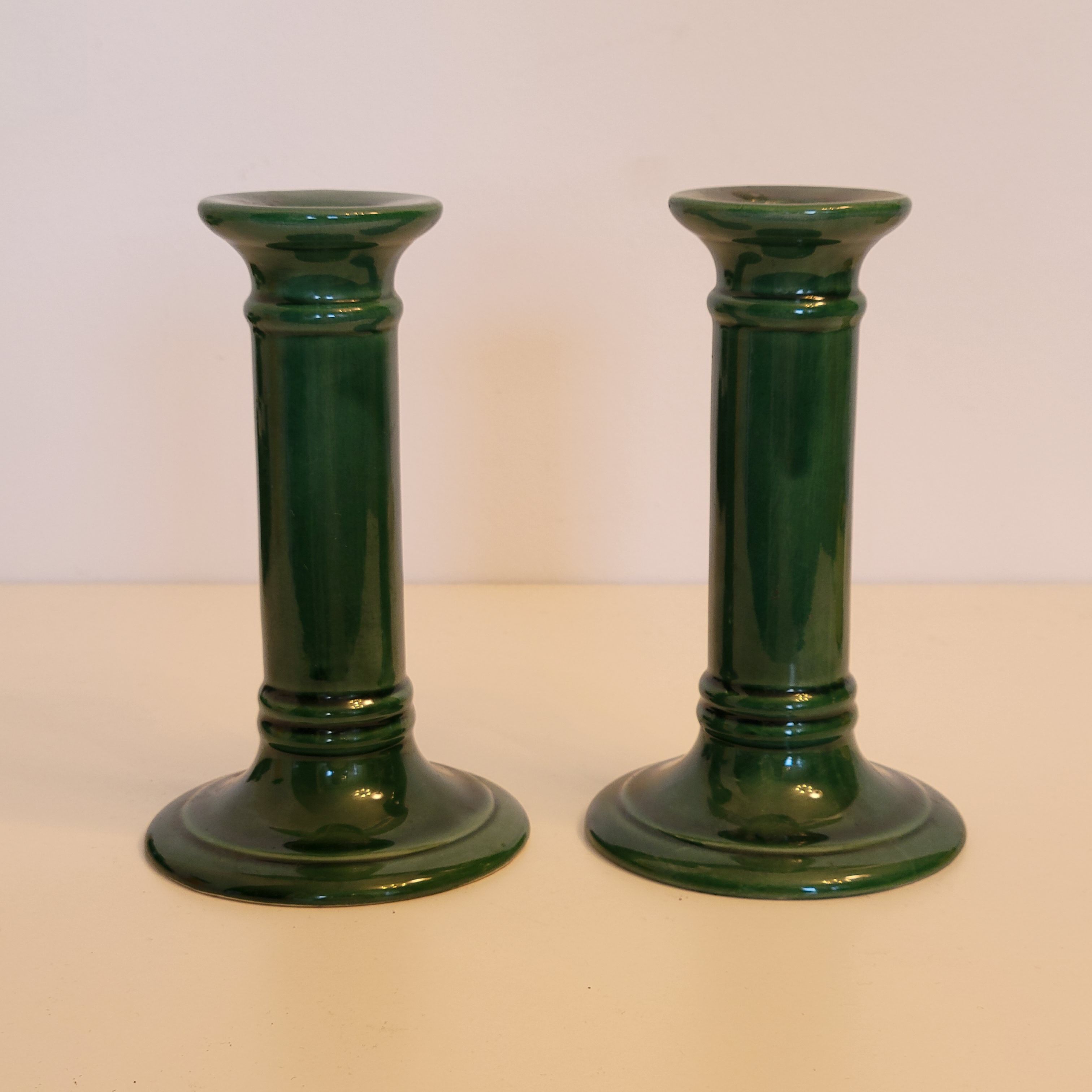 Pair of green ceramic candle holders