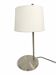 Large brushed metal table lamp with an ecru shade.