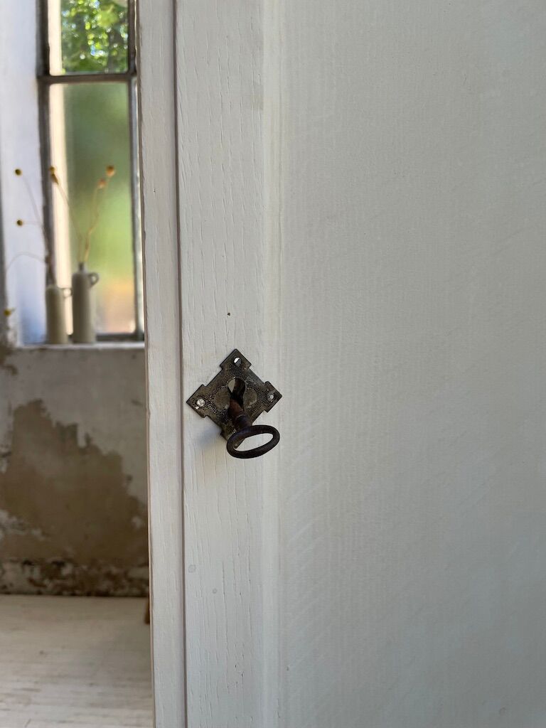 White and green cutter cabinet