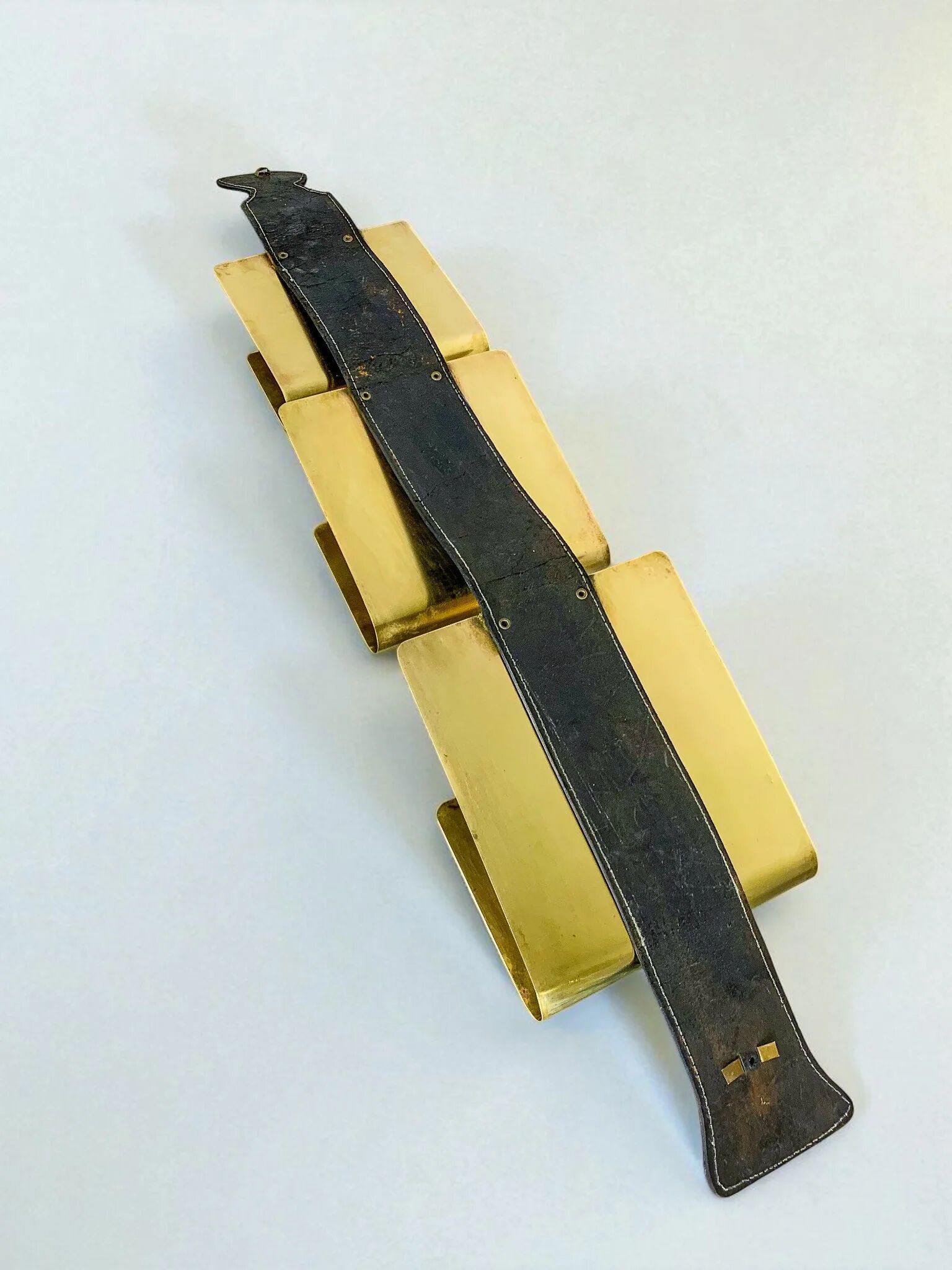 Valenti brass & leather wall-mounted magazine rack, Spain, 1970s