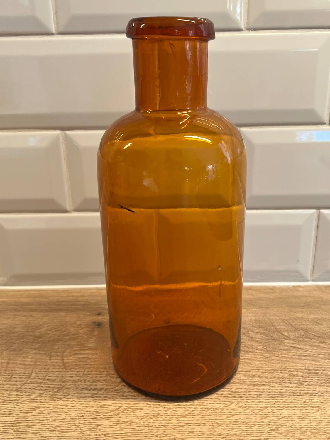 Amber glass bottle vase