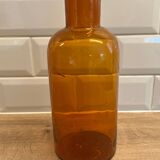 Amber glass bottle vase