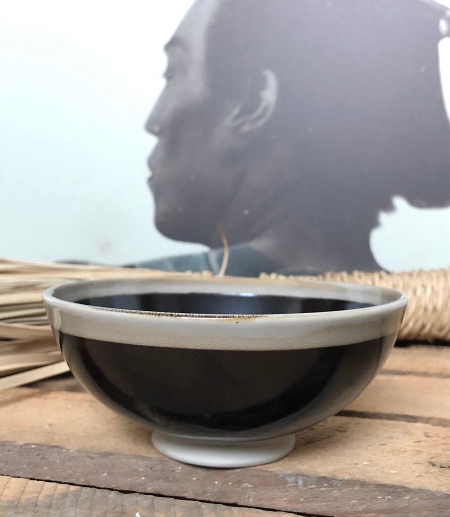 Lot of black ceramic-style bowls