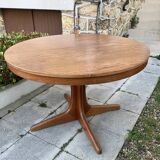 Extendable round dining table and 4 Baumann chairs.
