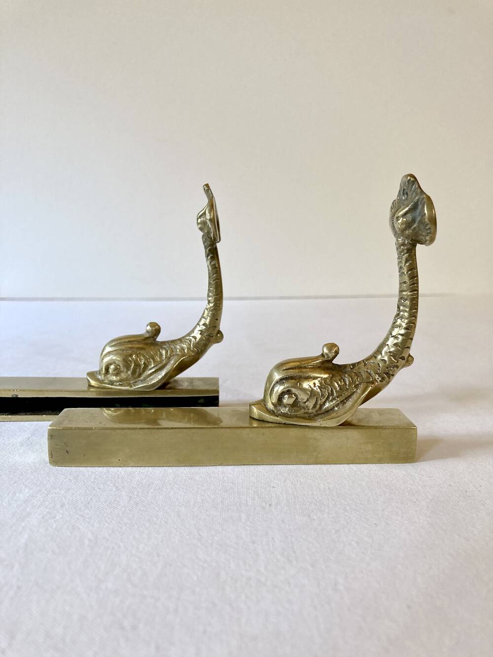 Brass wall supports for bathroom shelf, circa 1950.