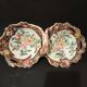 Double porcelain servant with floral decoration, polychrome and gilding – f