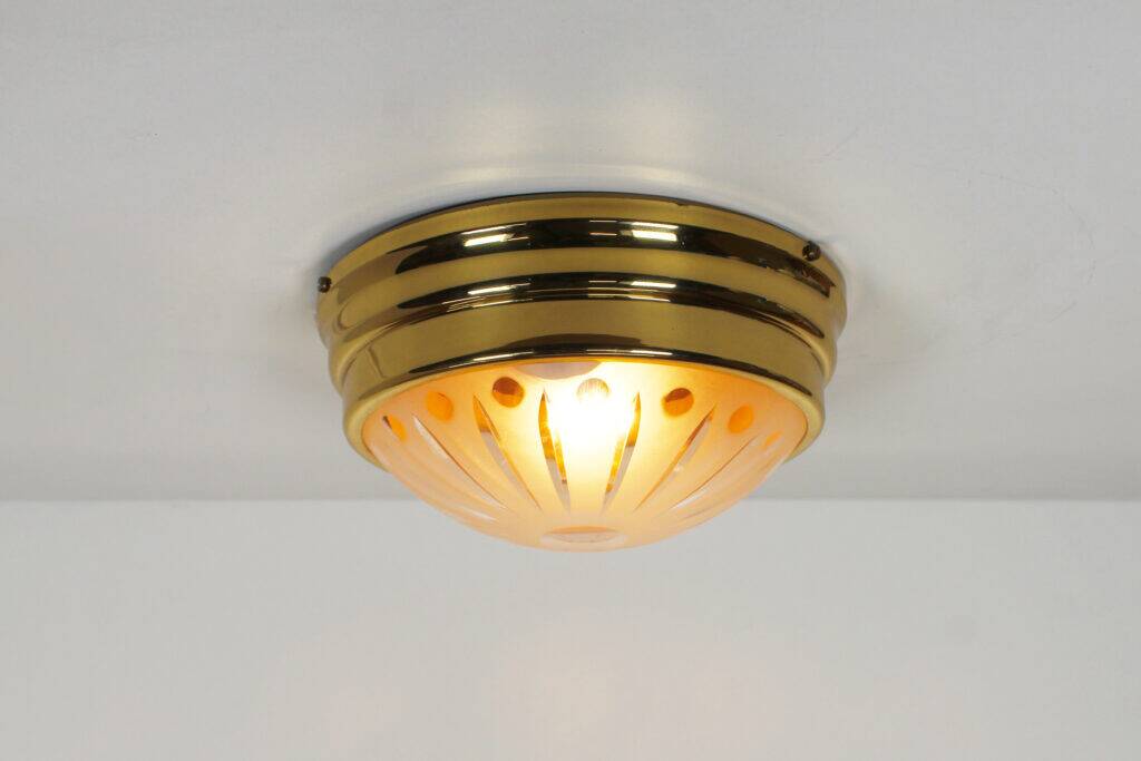 Pair of vintage brass ceiling lights with glass globe