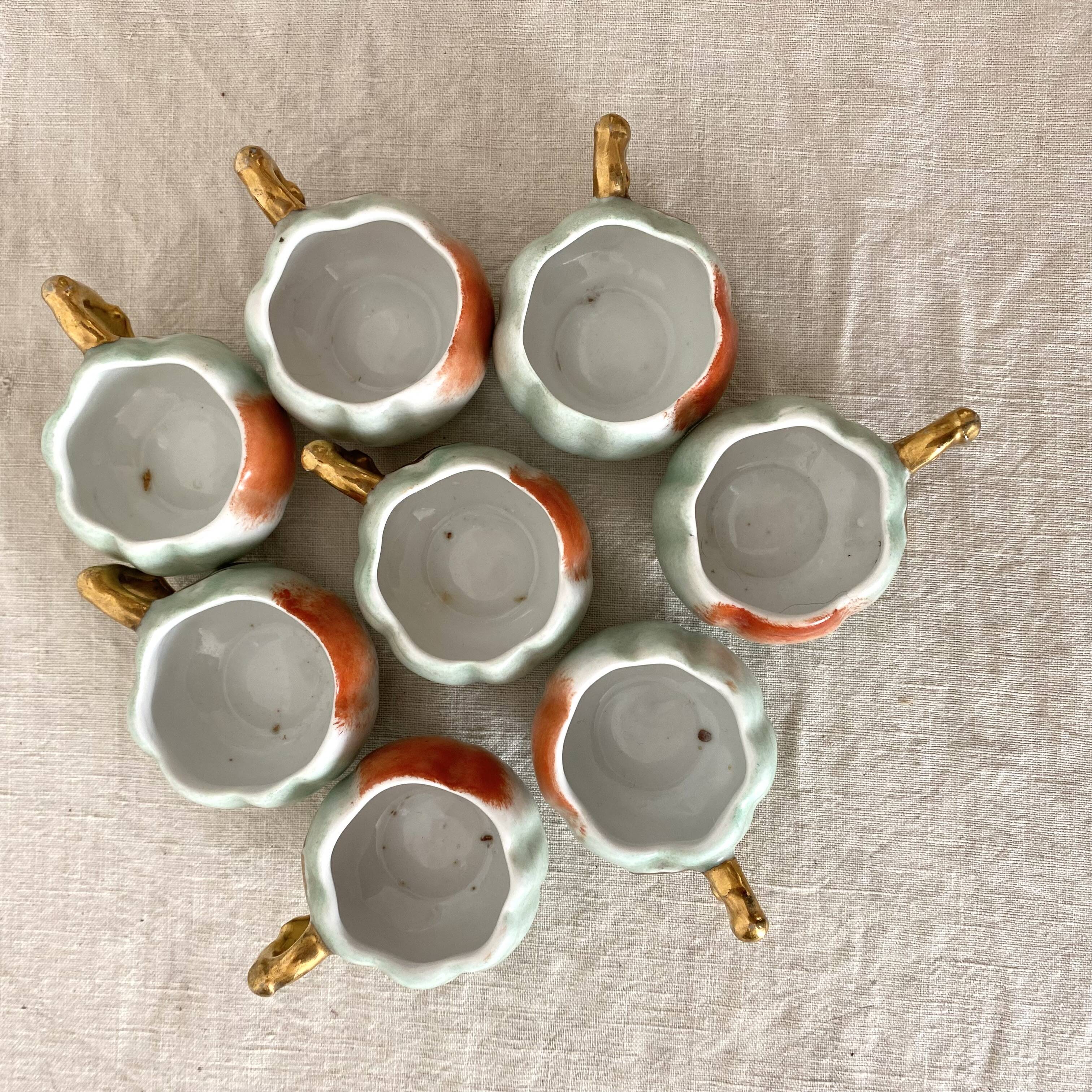 Calvados liqueur cups in slip, 1940s