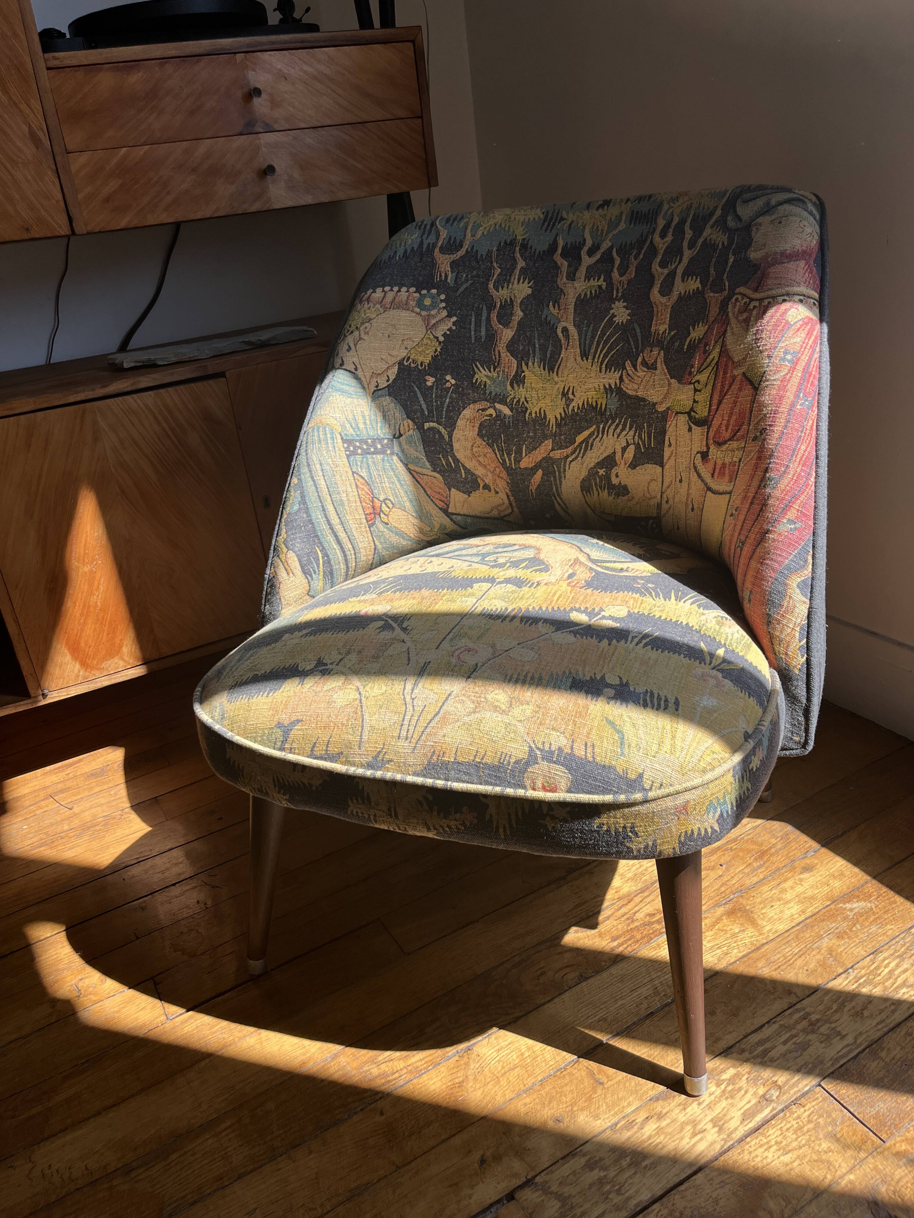 J. Tenreiro, Brazil. Concha armchair with tapered legs, Cluny tapestry 1400.