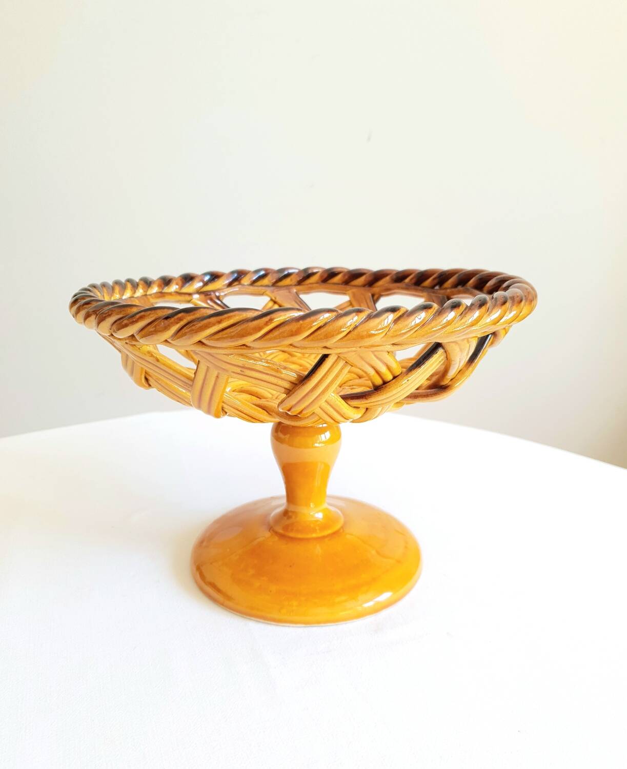 Braided bowl on ceramic base