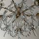 Grand chandelier in Louis XV style with crystal pendants.